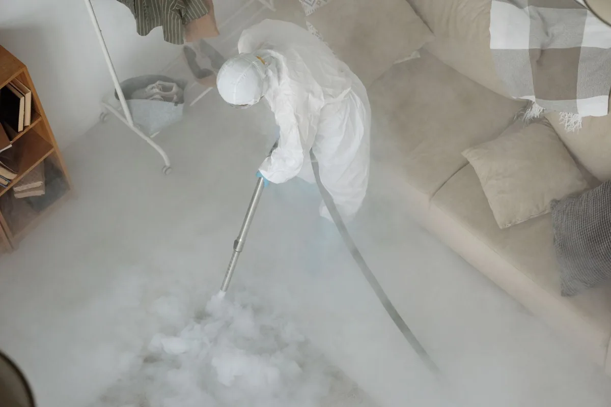 Biohazard cleanup technician in protective equipment, Barton Hills, Austin, TX